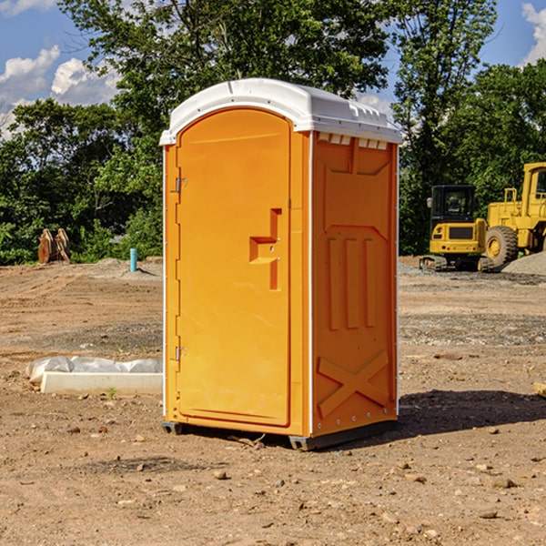 how often are the portable restrooms cleaned and serviced during a rental period in Scarbro